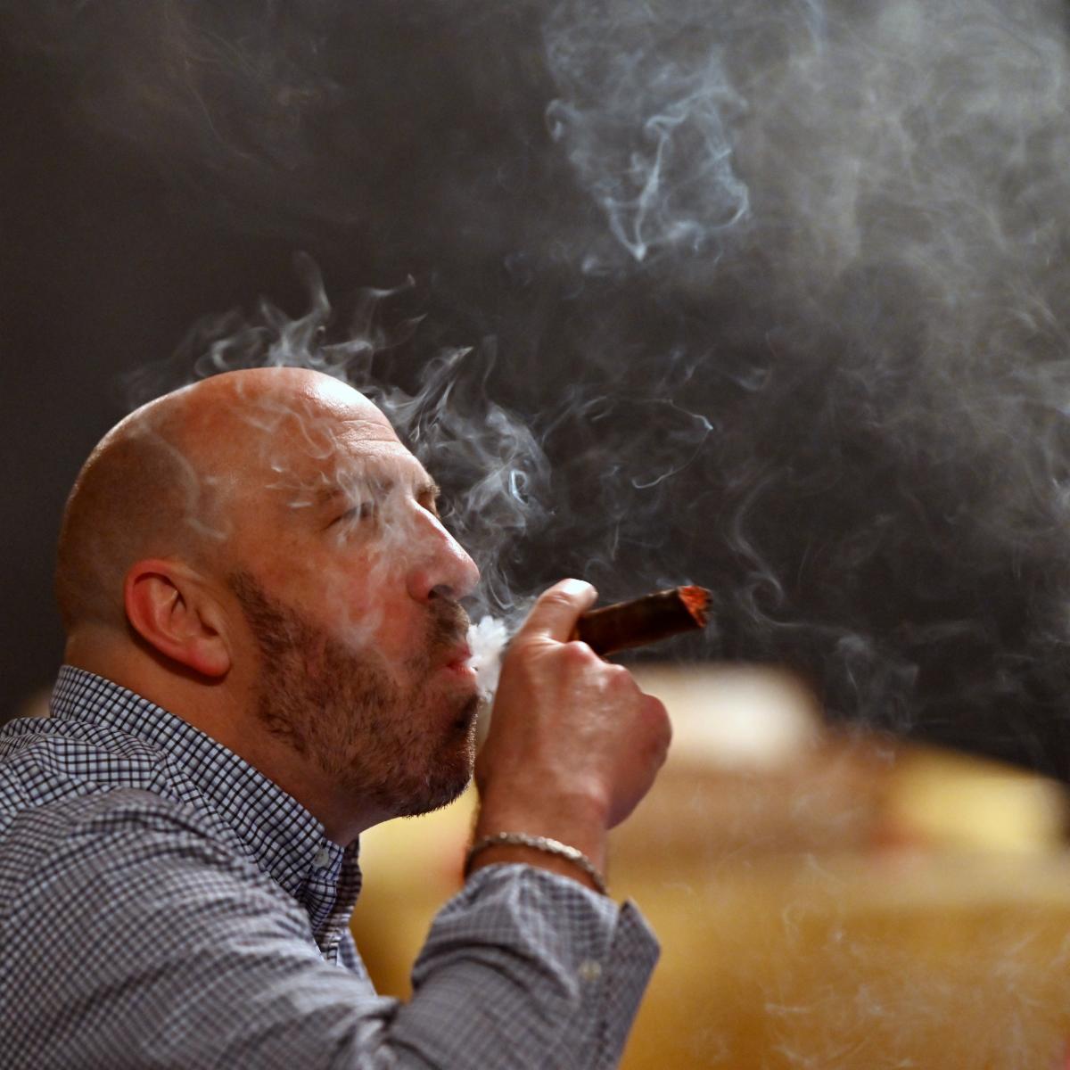 Man smoking cigar